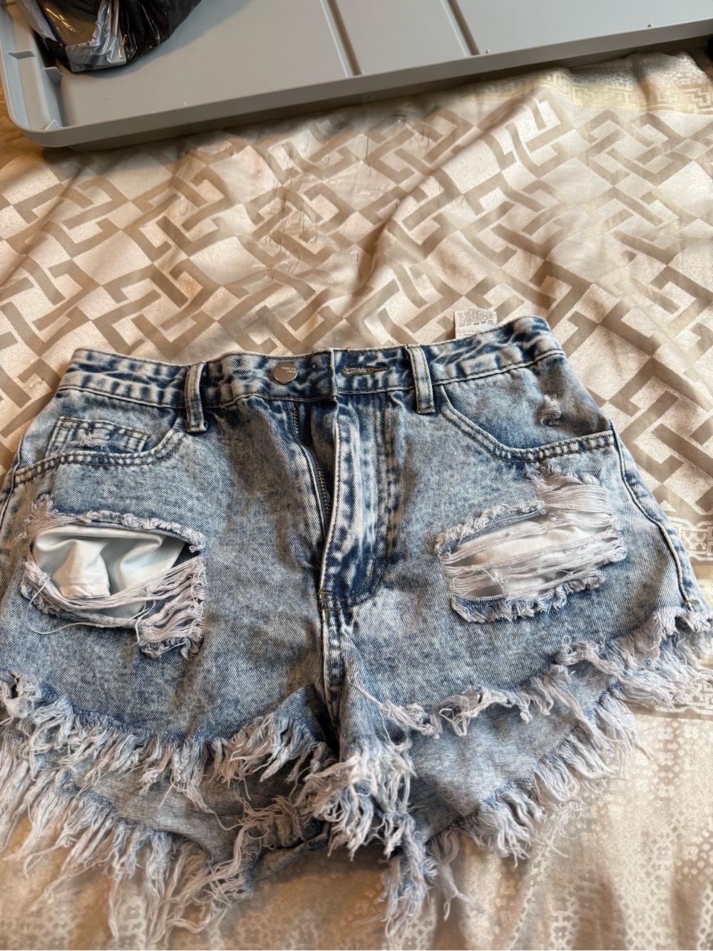 High-Rise Distressed Light Blue Denim Shorts